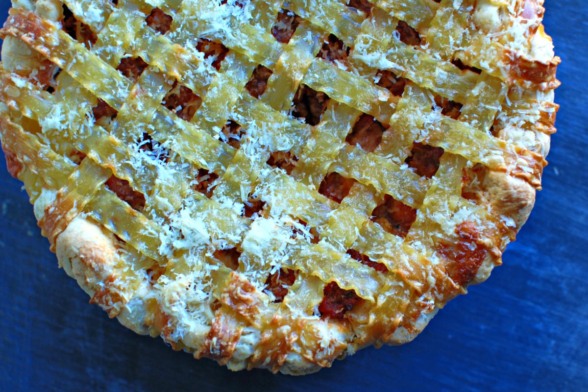 the deep dish lasagna pizza looking good out of the oven, 