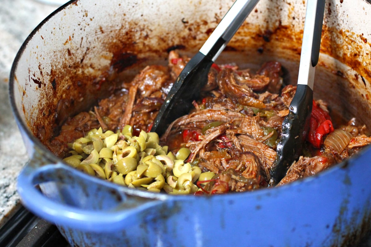 adding the olives