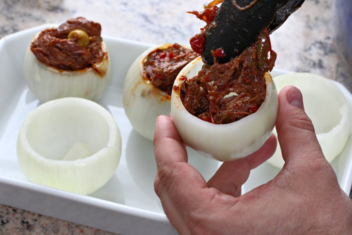 stuffing onions with the leftover ropa vieja